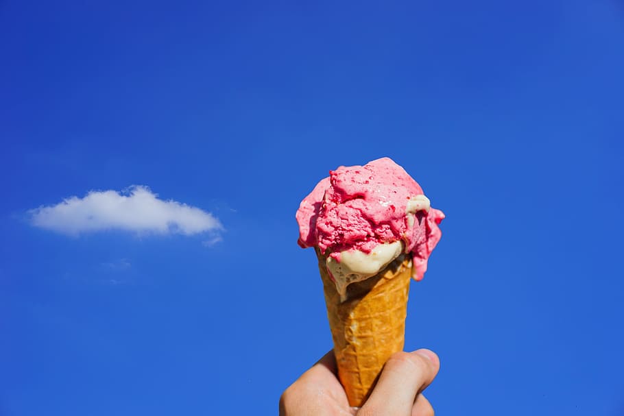 person, holding, pink, ice cream, ice, milk ice cream, soft ice cream, ice cream cone, waffle, eating ice cream
