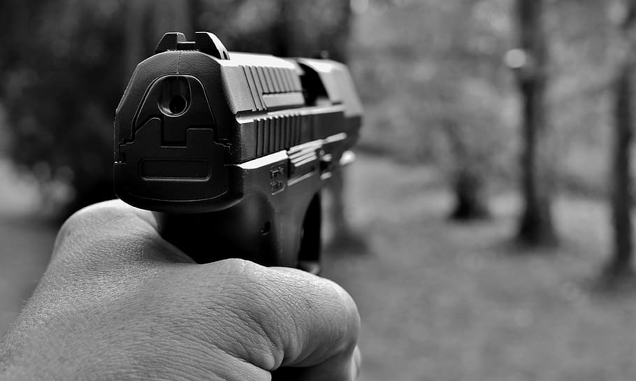 grayscale photography, person, holding, black, semi-automatic, pistol, weapon, target, crime, fight