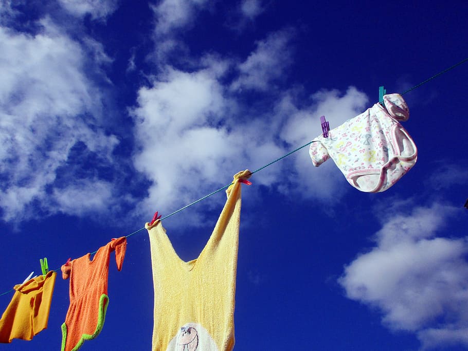 four, assorted-color clothes, hanging, rope, clothes line, wash clothes, laundry, dry, air dry, baby
