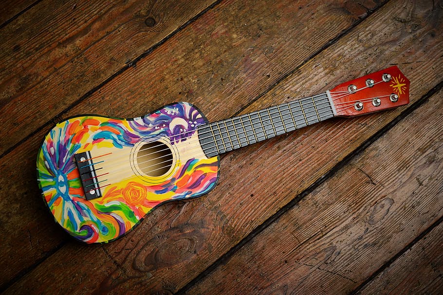 multicolored ukulele, guitar, gitarka, music, colors, instrument, wood - material, multi colored, indoors, table