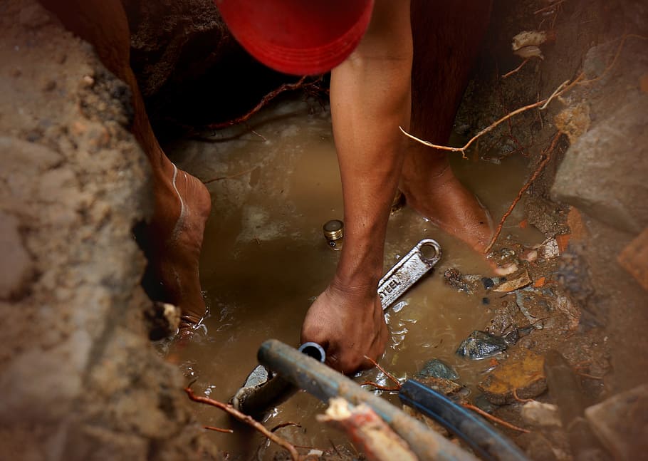 person, holding, wrench, swamp, daytime, labor, plumber, life, hands, vietnam