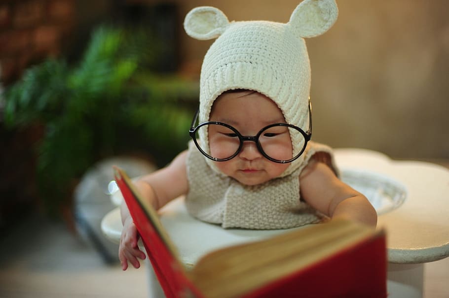 baby, wearing, gray, knitted, pram suit, eyeglasses, holding, book, son, cute