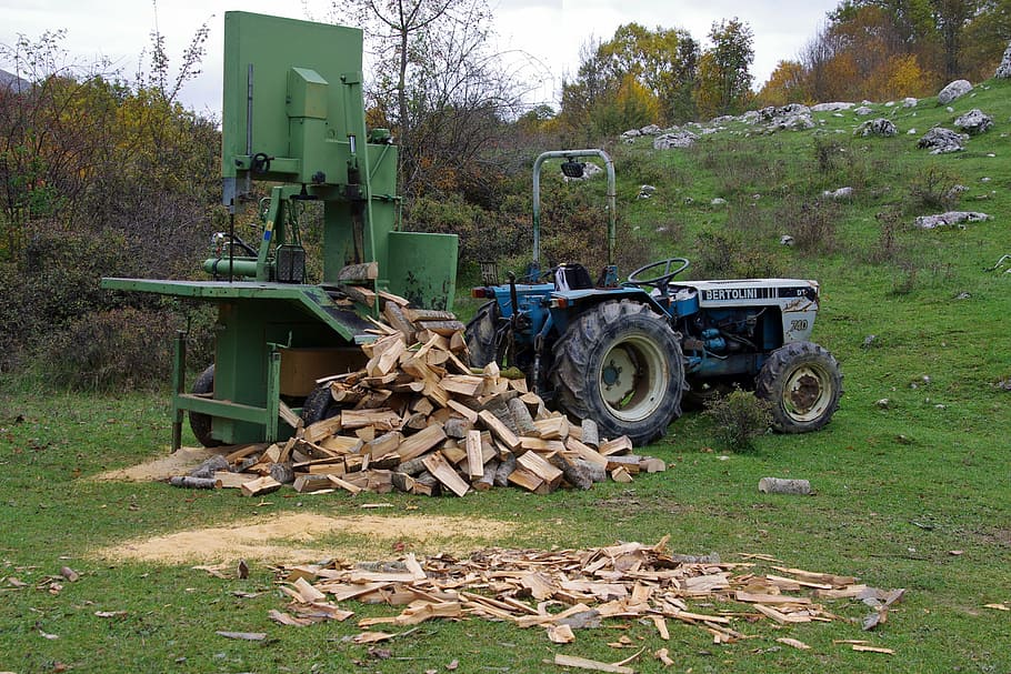 wood, logs of wood, tractor, power saw, lumber, trunks of trees, pile of wood, firewood, logs, plant
