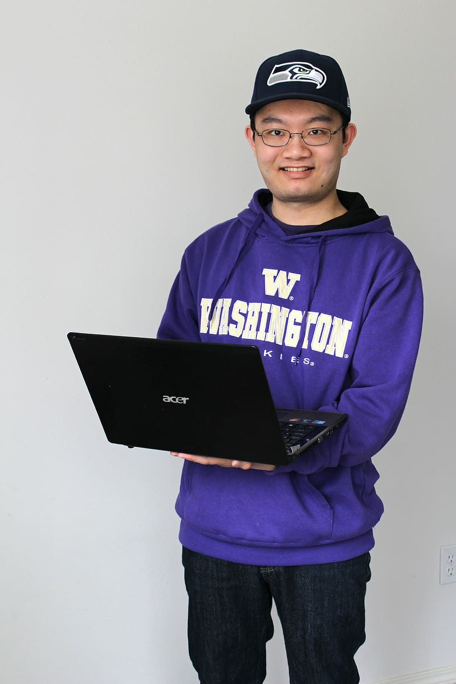 man, holding, black, acer laptop computer, student, college, college student, laptop, university, education