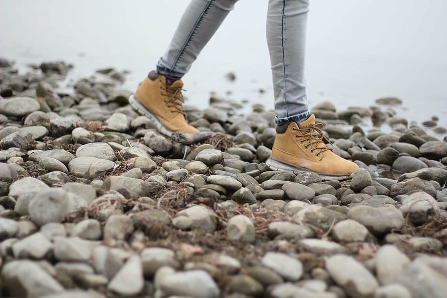 person, walking, rocks, hiking, hiking shoes, hiking boots, walking shoes, pebbles, water, river