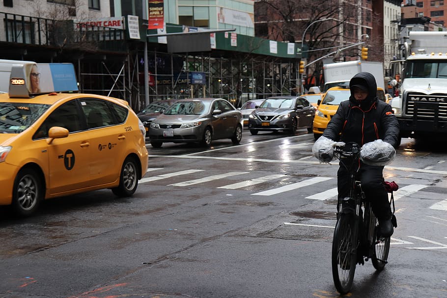 new york, nyc, urban, manhattan, traffic, scooter, motorbike, rain, raincoat, mode of transportation