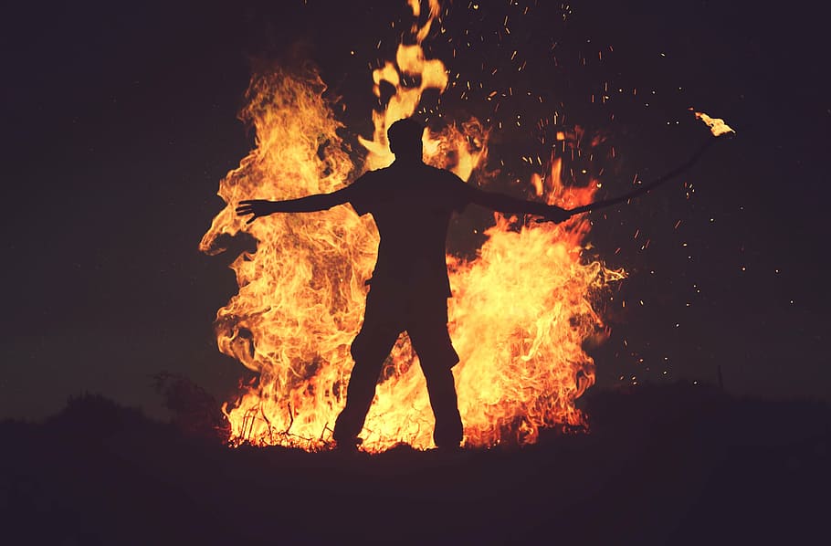 silhouette, man, standing, front, bone fire, nighttime, next, bonfire, night, fire