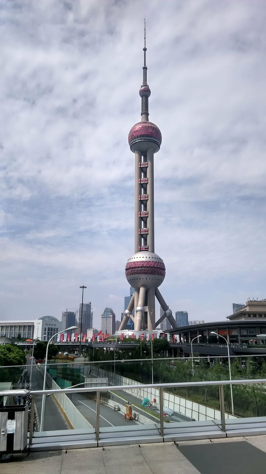 shanghai, china, oriental pearl television tower, architecture, built structure, sky, building exterior, cloud - sky, city, tall - high