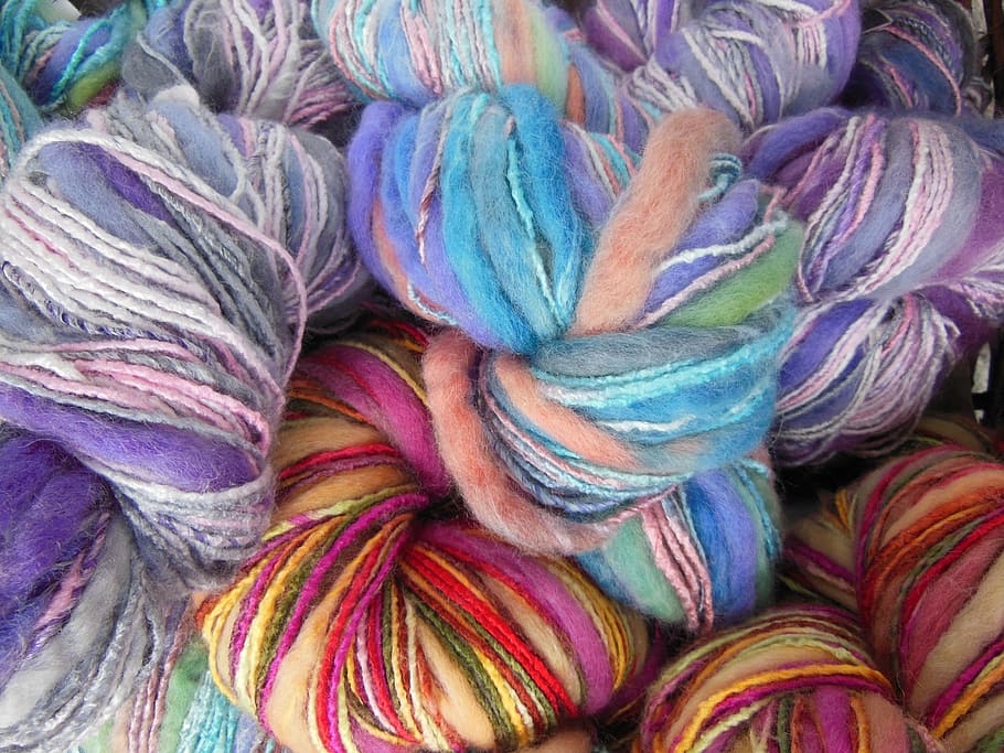 closeup, assorted-color tutu wreath, yarn, colored, multi-colored, knitting, needlework, soft, woolen, purple