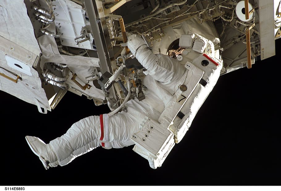 astronaut, spacewalk, space shuttle, discovery, tools, suit, pack, tether, floating, job
