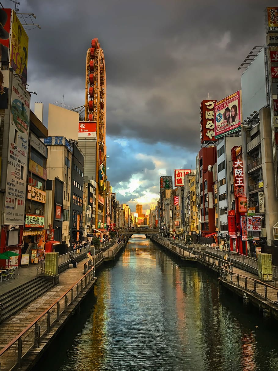canal between buildings, japan, osaka, river, building, cloud - sky, reflection, architecture, building exterior, outdoors