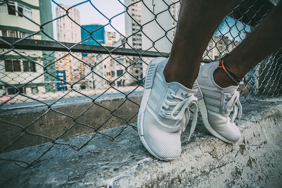 sneakers, shoes, feet, concrete, chainlink, fence, city, urban, people, shoe