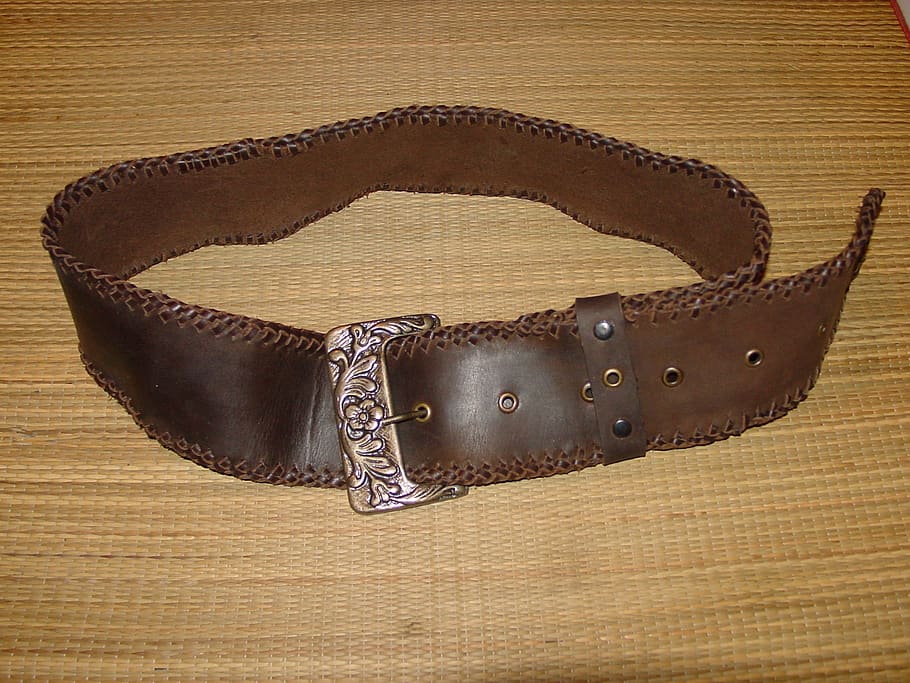 belt, skin, leather goods, buckle, wood - material, brown, single object, table, close-up, indoors