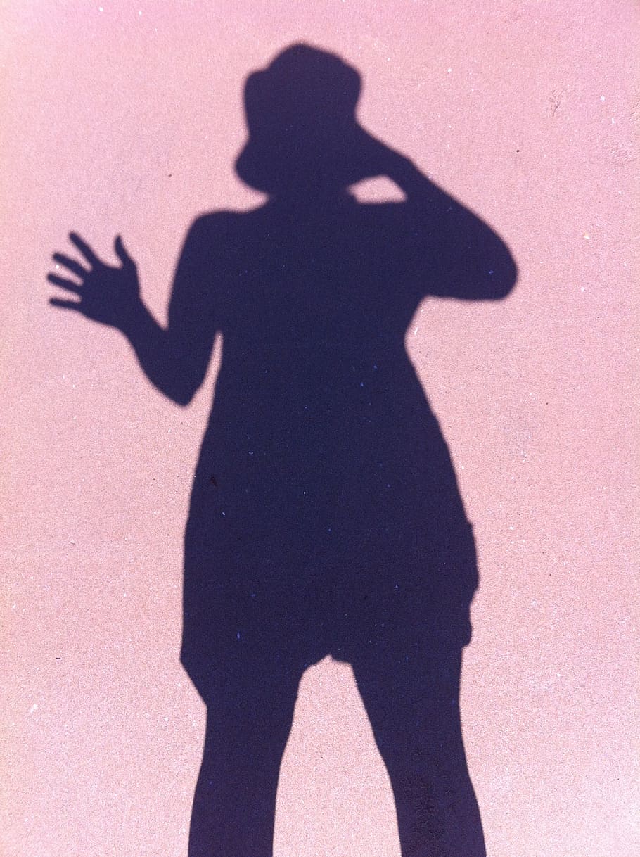 shadow, silhouette, person, focus on shadow, one person, sunlight, real people, three quarter length, standing, lifestyles