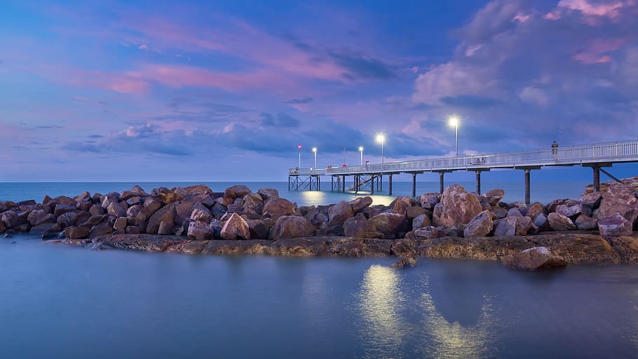 rock near dock, sunset, peer, tropical, darwin, australia, ocean, fishing, water, sky
