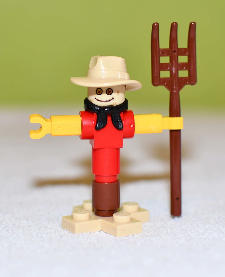 pads, toy, scarecrow, toys, forks, close-up, red, indoors, still life, wood - material