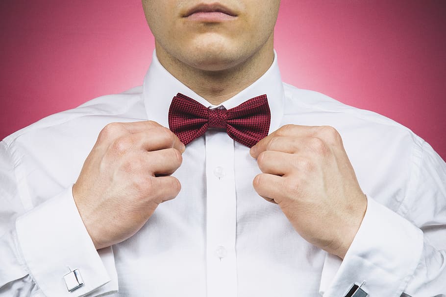 man, holding, red, bow tie, bowtie, dress shirt, cufflinks, fashion, gentleman, guy