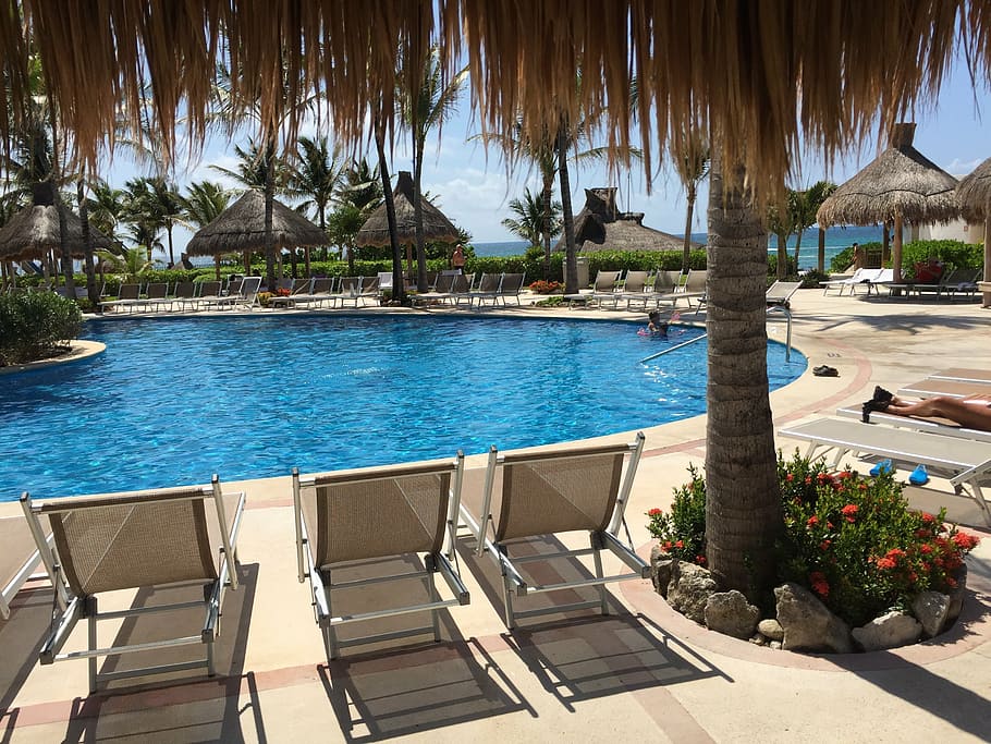 three, brown, lounge chairs, below-ground pool, cancun, ocean, pool, beach, peaceful, solitude