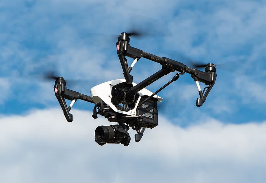 black, white, quadcopter drone, flying, cloudy, sky, daytime, drone, multicopter, dji