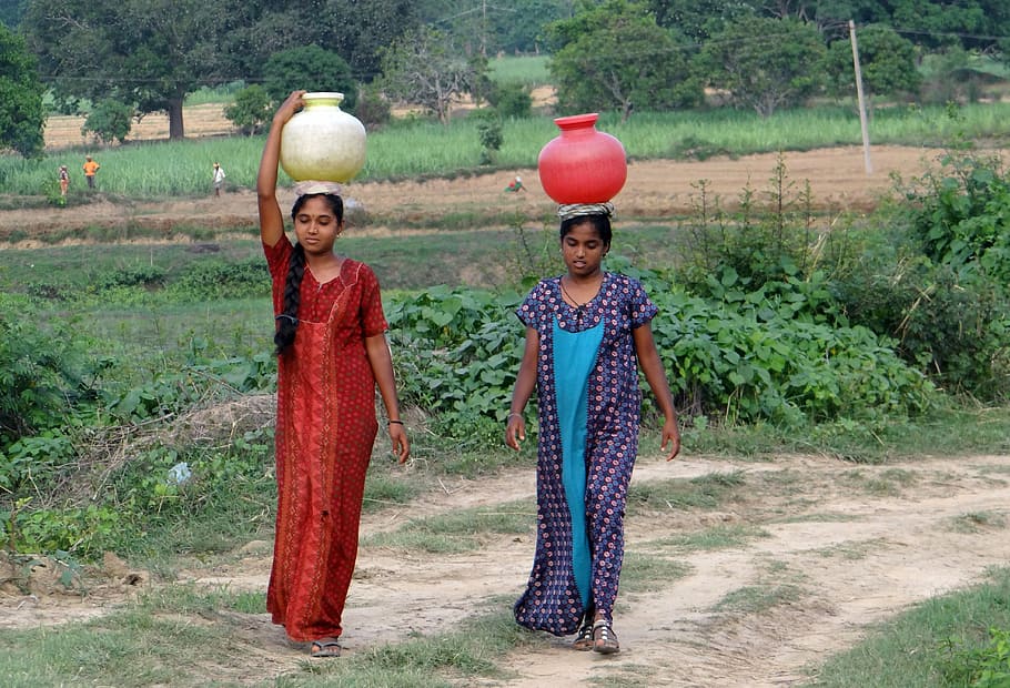 two, women, standing, wearing, jars, village, fetching water, pot, hands-, balance