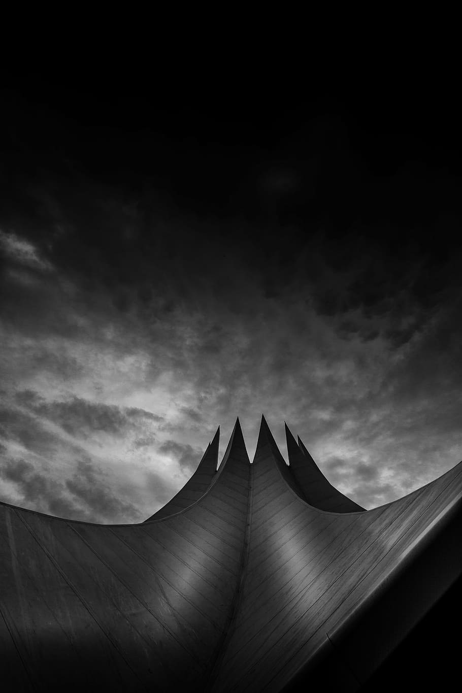 ant view, building, cloudy, sky, architecture, infrastructure, cloud, black and white, roof, night