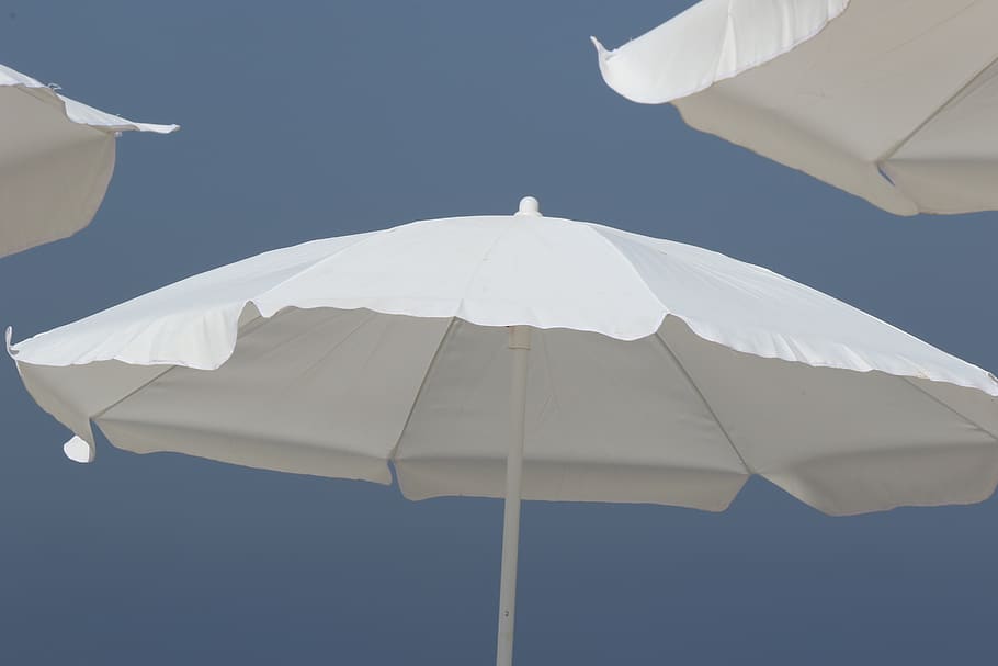 umbrellas, skies, beach, vacation, relax, sky, umbrella, parasol, clear sky, low angle view