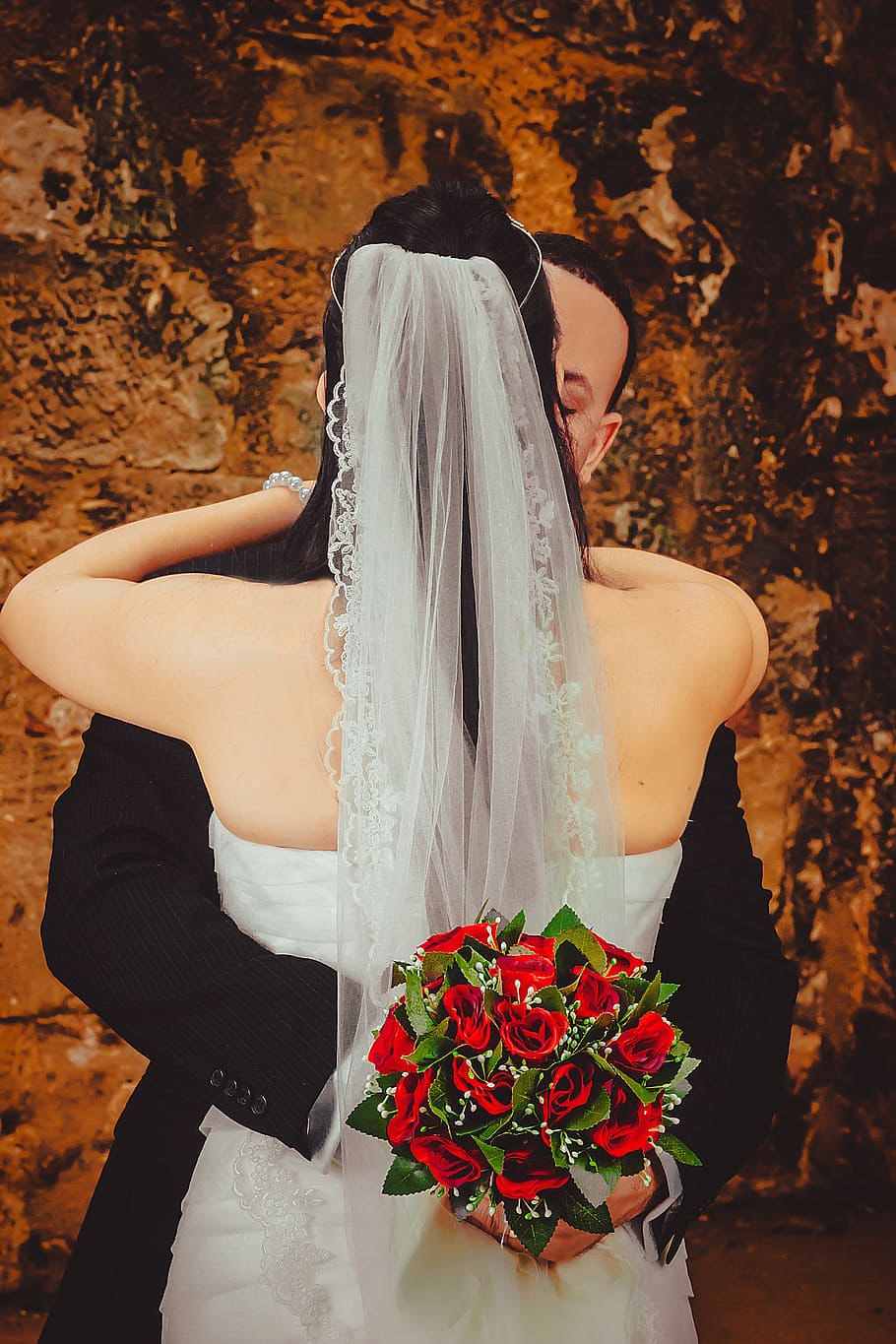 wedding couple, kissing, brown, concrete, wall, wedding, grooms, embracing each other, kiss, emgombe