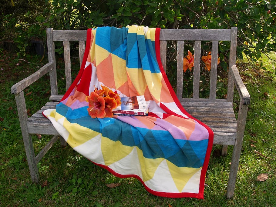 bench, seat, rug, wooden, colorful, books, flowers, hibiscus, patterns, outdoor