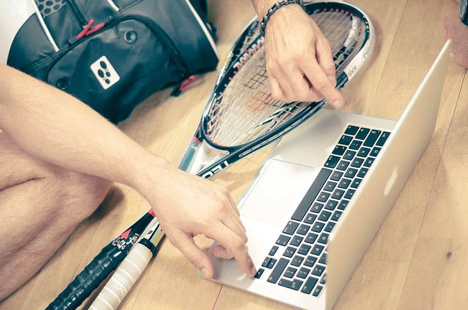 two, people, pointing, macbook, pro, beige, wooden, surface, squash, sport