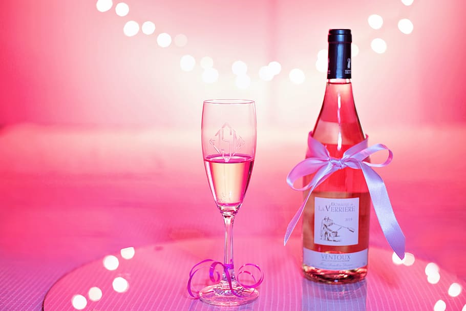 white, labeled, glass bottle, wine glass, pink wine, champagne, celebration, pink, valentine's day, wedding