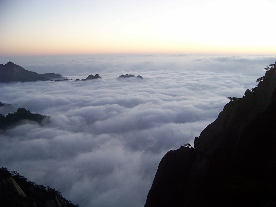 Huangshan, Clouds, Sunrise, cloud - sky, scenics, nature, sky, tranquility, outdoors, beauty in nature