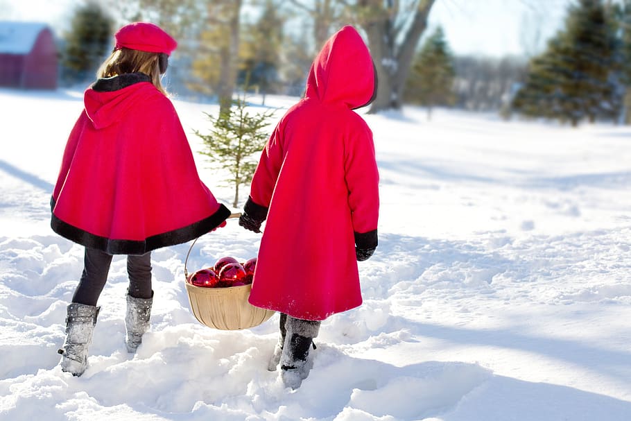 two, toddler, wearing, red, robe, walking, white, snow, covered, ground