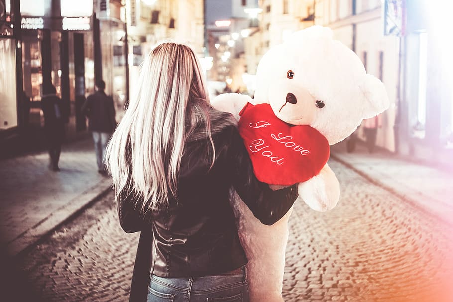 young, woman, big, valentine’s, day, gift, teddy, bear, Holding, Valentine’s Day