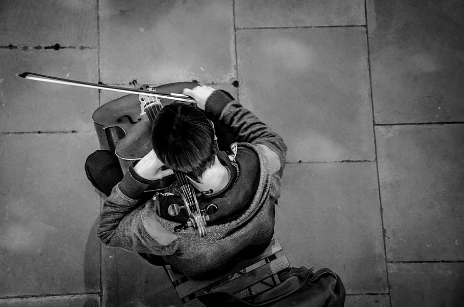 grayscale photo, man, playing, string instrument, cello, player, busker, musician, music, classical