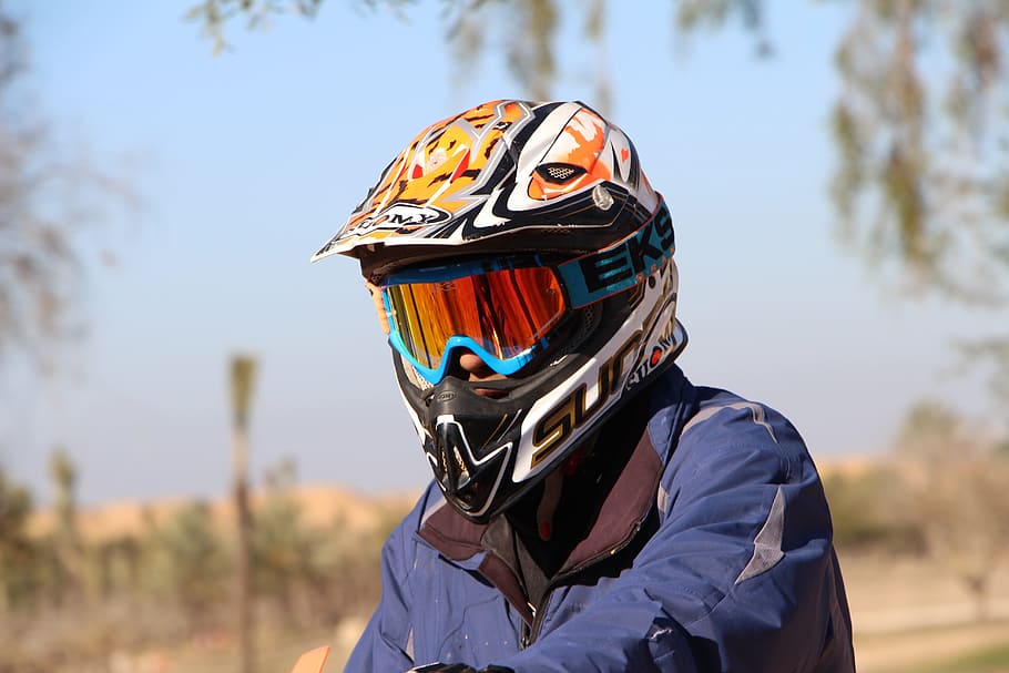 person, wearing, multicolored, motocross helmet, biker, helmet, motorbike, motorcycle, travel, road