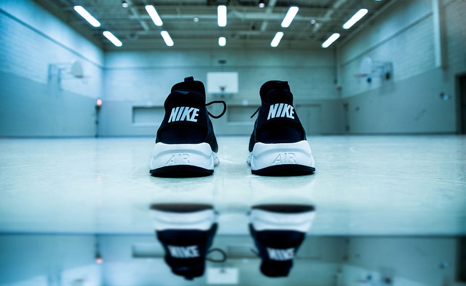 pair, white-and-black, nike, air, low-top, sneakers, white, floor, surface, architecture