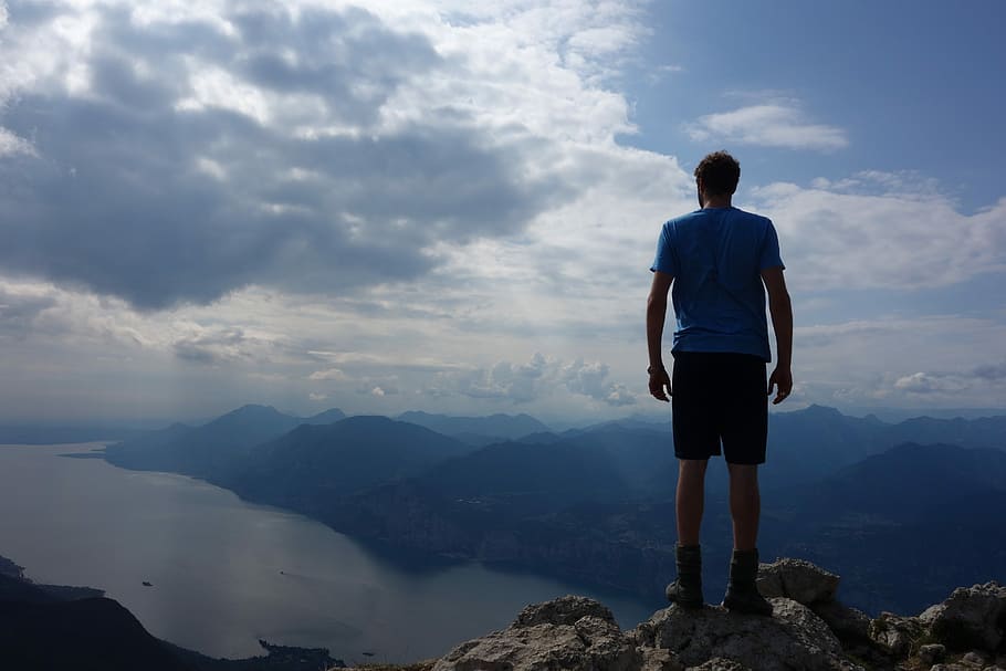 man, standing, mountain cliff, cloudy, sky, daytime, mountain, hike, panorama, nature