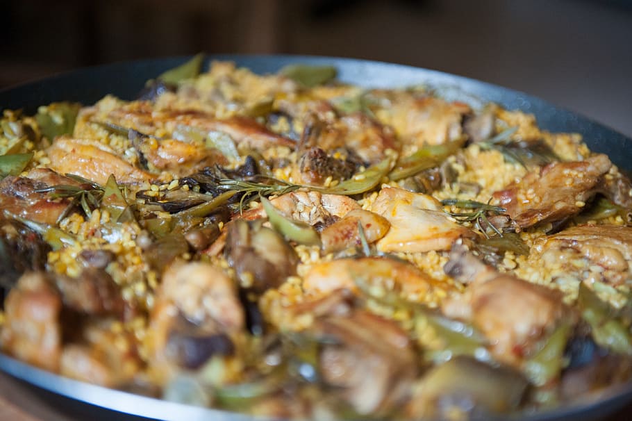 paella, rabbit, chicken, artichokes, saffron, rice dish, national dish, valencia, spain, eat