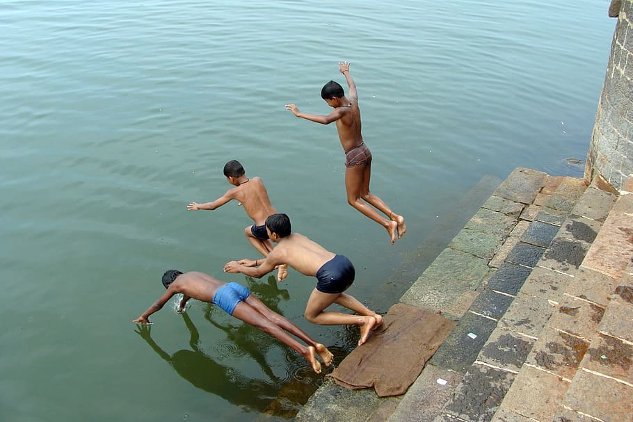 boys, diving, water, daytime, children, river, krishna, karnataka, india, fun