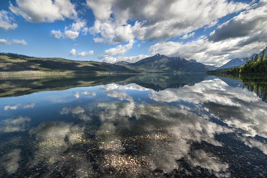 landscape photography, mountains, surrounded, body, water, daytime, lake mcdonald, landscape, clouds, reflection