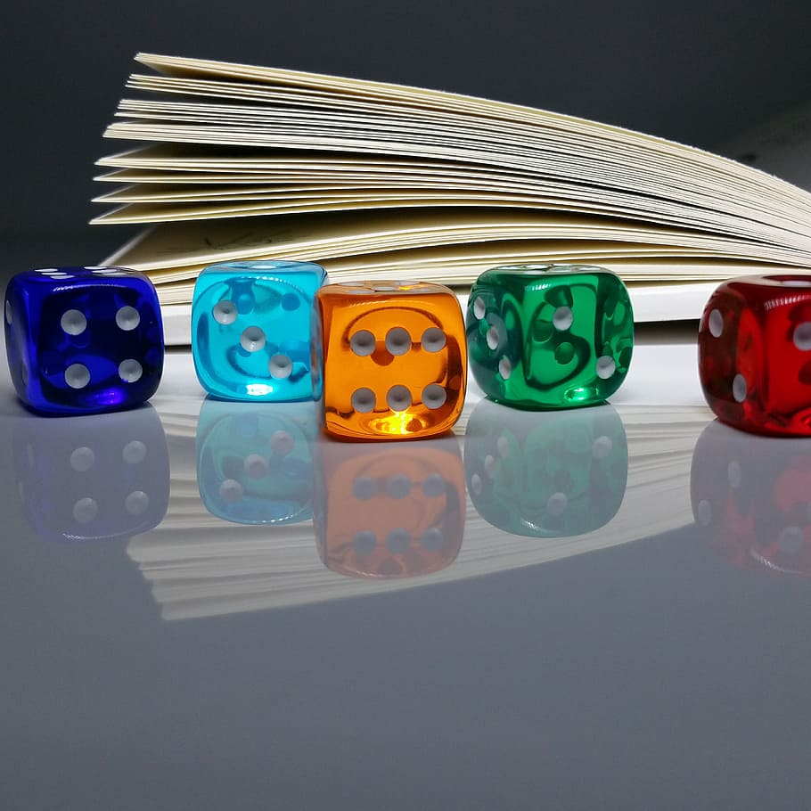 five, assorted-color dices, book, luck, lucky dice, cube, colorful, multi colored, indoors, still life
