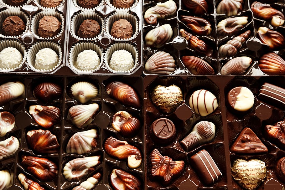 seashell chocolate lot, chocolates, background, box, brown, candy, chocolate, confectionery, dessert, food