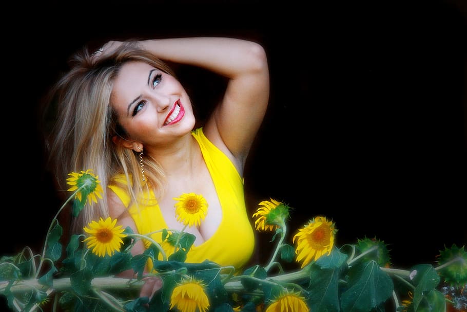 woman, wearing, yellow, scoop-neck sleeveless, top, front, sunflowers, girl, sunflower, smile