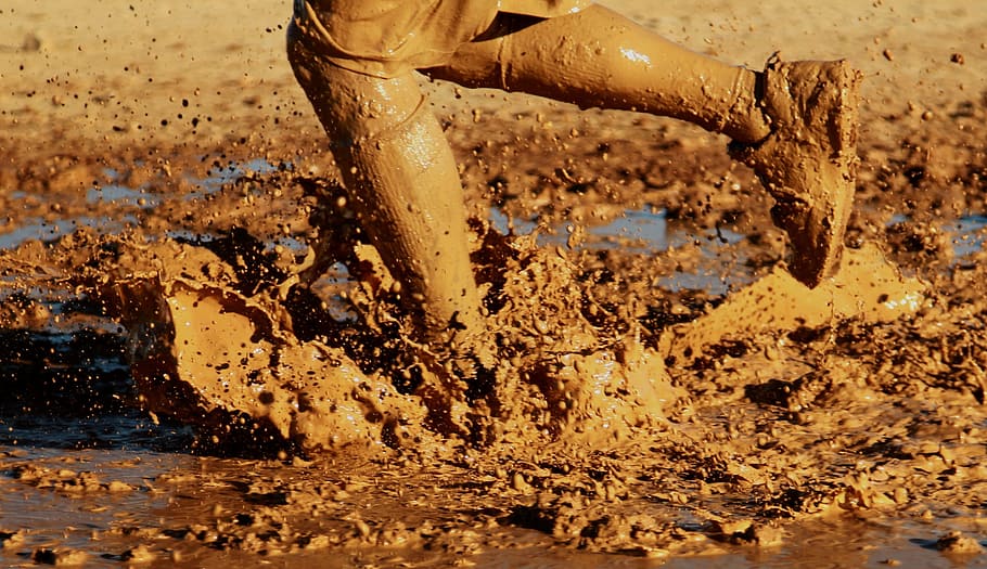 person, mud, daytime, running, water, outside, muddy, splash, splashing, race