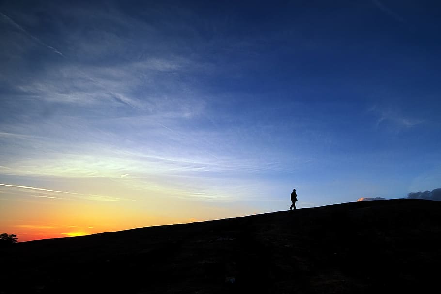 man, standing, mountain, sunset, monadnock, granite, outcropping, alone, walking uphill, barren