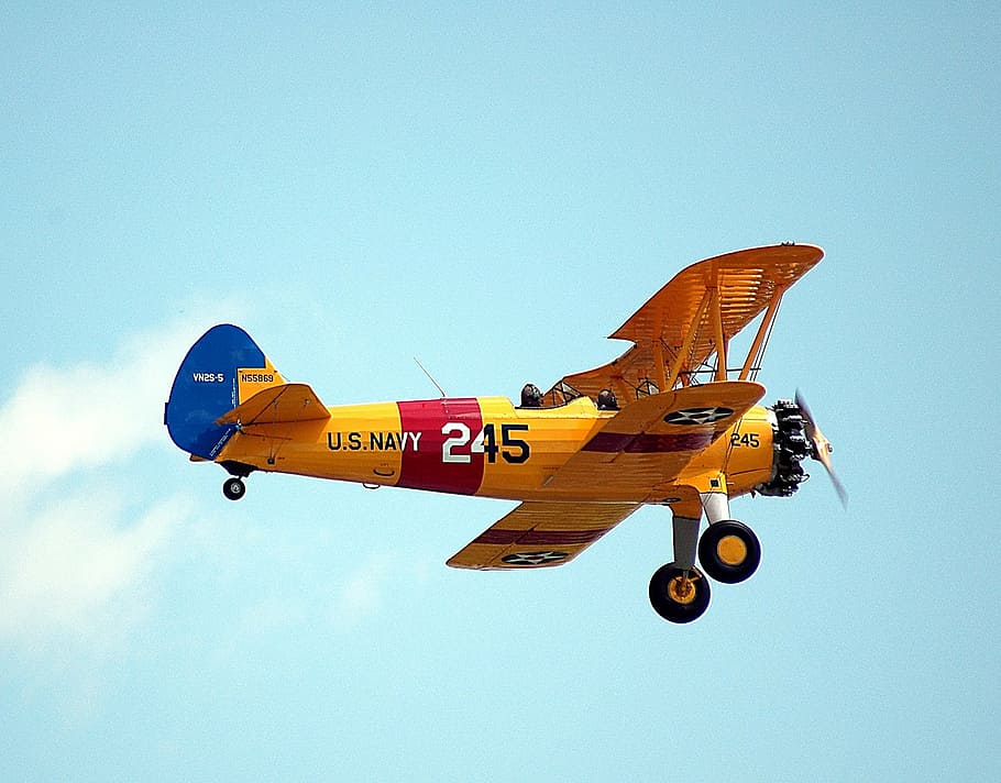 yellow, red, u.s., navy 245 plane, white, clouds, daytime, vintage aircraft, flying, flight