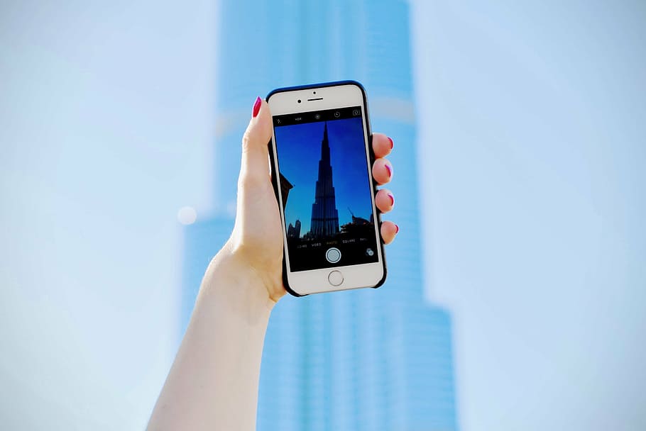 pessoa, tirando, foto, edifício Burj Khalifa, Dubai, dia, telefone, celular, pessoas, fotografia