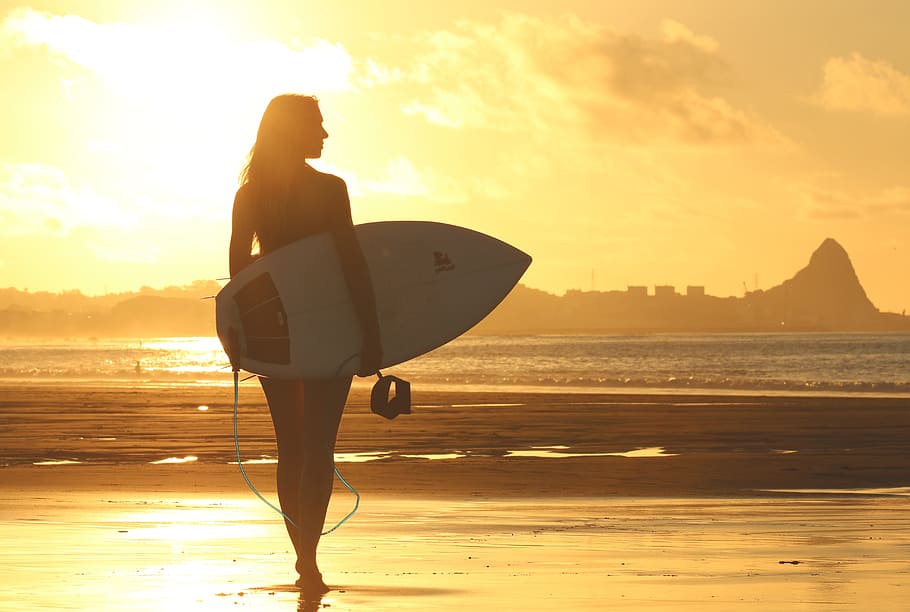 silhouette photography, woman, holding, surfboard, beach, clouds, dawn, girl, ocean, recreation