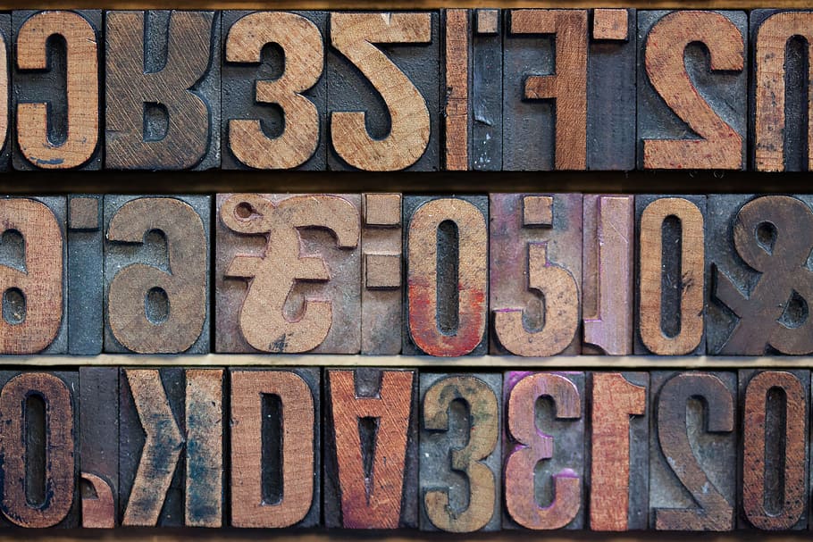 closeup, brown, engraved, board, letters, wooden alphabet letters, pound, english, mirrored, sans serif
