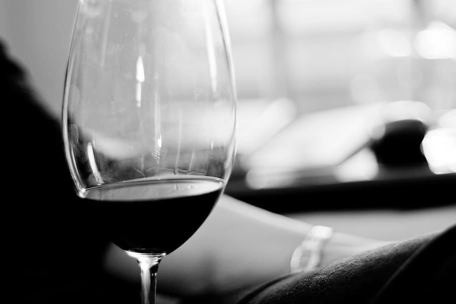 grayscale photo, clear, glass long-stem wine glass, grayscale, long, stem, wine glass, wine, white wine, glass